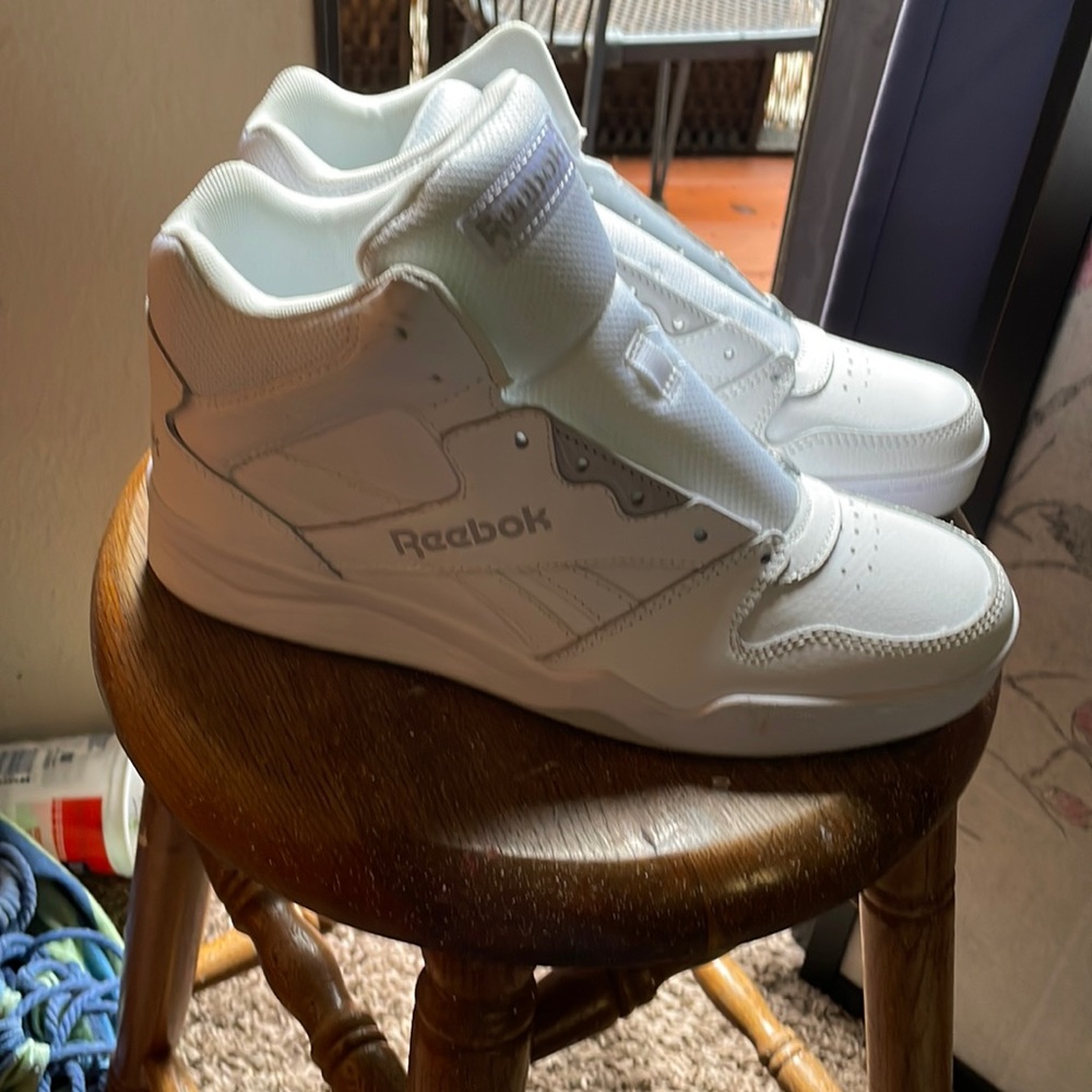 White Reebok basketball shoes